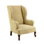 A Victorian wing armchair,
