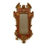 A Baroque style parcel gilt mirror
