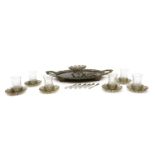 A filigree white metal and glass coffee set,