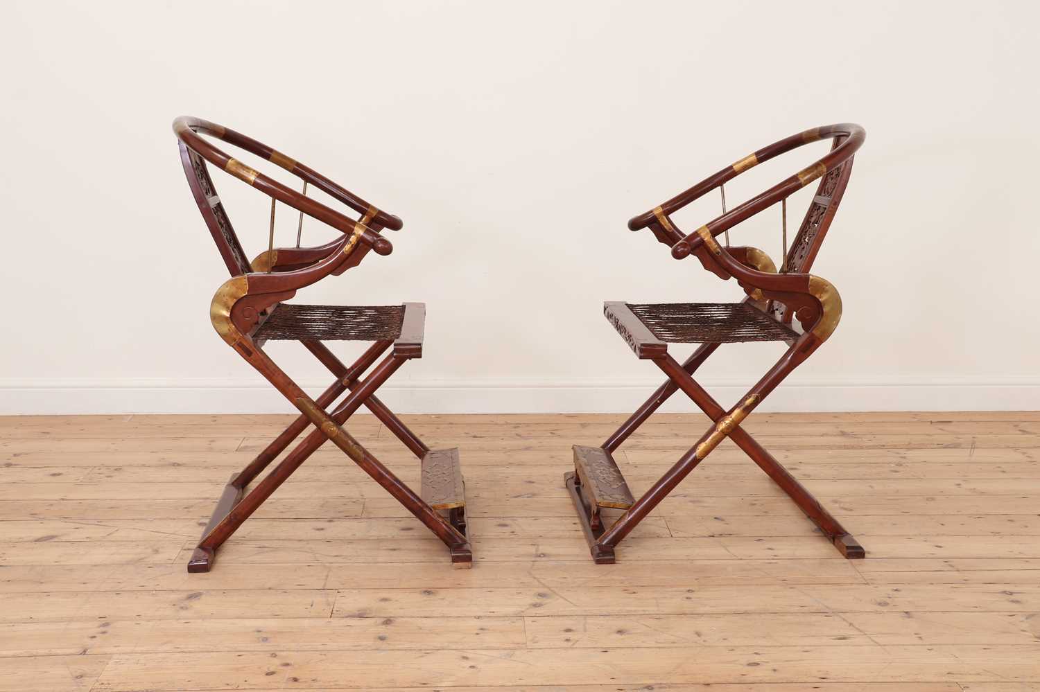 A pair of Chinese hardwood horseshoe-back folding chairs, - Image 5 of 9