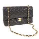 A Chanel black leather medium flap bag,