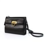 A Salvatore Ferragamo black leather shoulder bag,