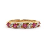 A 9ct gold ruby and diamond half eternity ring,
