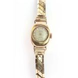 A Ladies' 18ct gold Acron mechanical bracelet watch,
