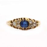 An early 20th century sapphire and diamond boat shaped ring,