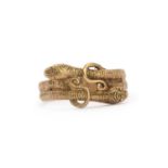 A yellow metal two headed serpent ring,
