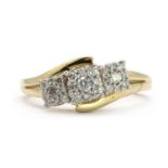 A 9ct gold diamond triple cluster ring,