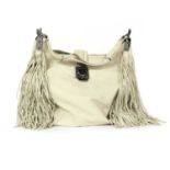 A Celine cream leather tassel hobo bag,