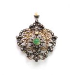 A Portuguese silver and gold, emerald and diamond brooch pendant,