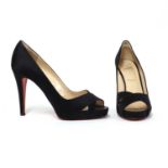 A pair of Christian Louboutin black satin peep toe shoes,