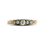 A five stone diamond carved head ring,