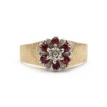 A 9ct gold ruby and diamond cluster ring,