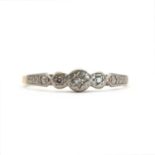 An 18ct diamond three stone ring,
