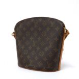 A Louis Vuitton monogrammed canvas cross body bucket bag,