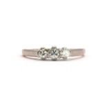 A gold three stone diamond ring,