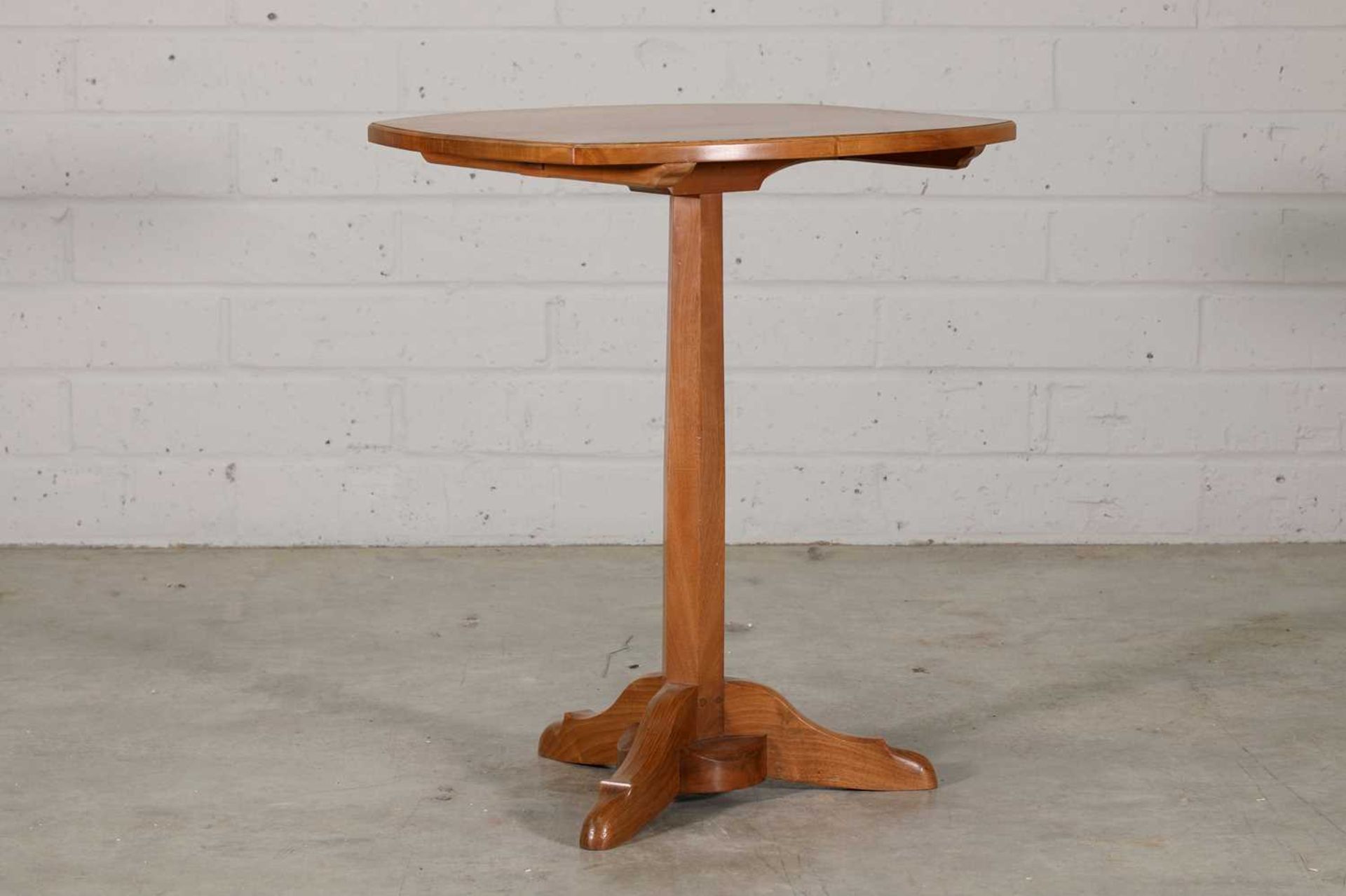 A walnut table side table,