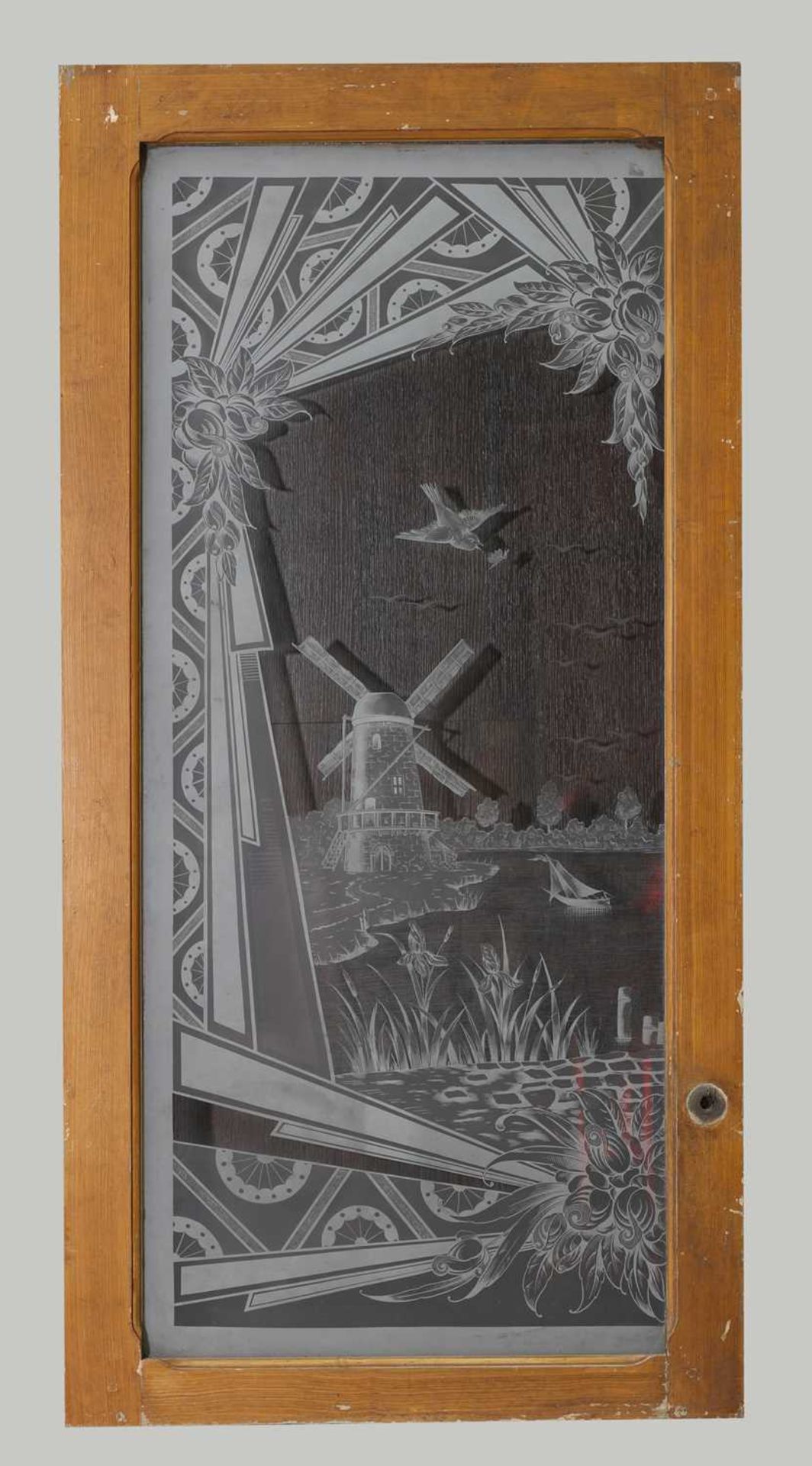 A pair of large Art Deco etched glass panels,