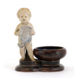 A Doulton stoneware figural salt,