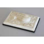 An Arts and Crafts marble paperweight,