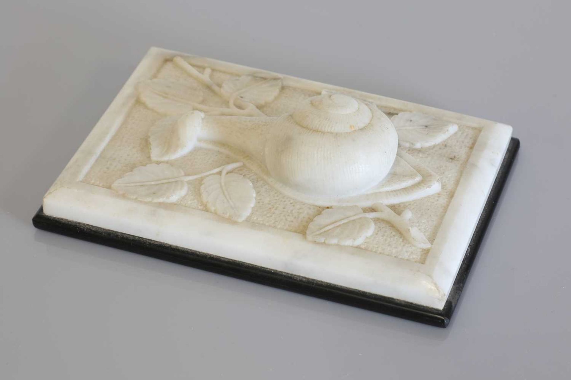 An Arts and Crafts marble paperweight,
