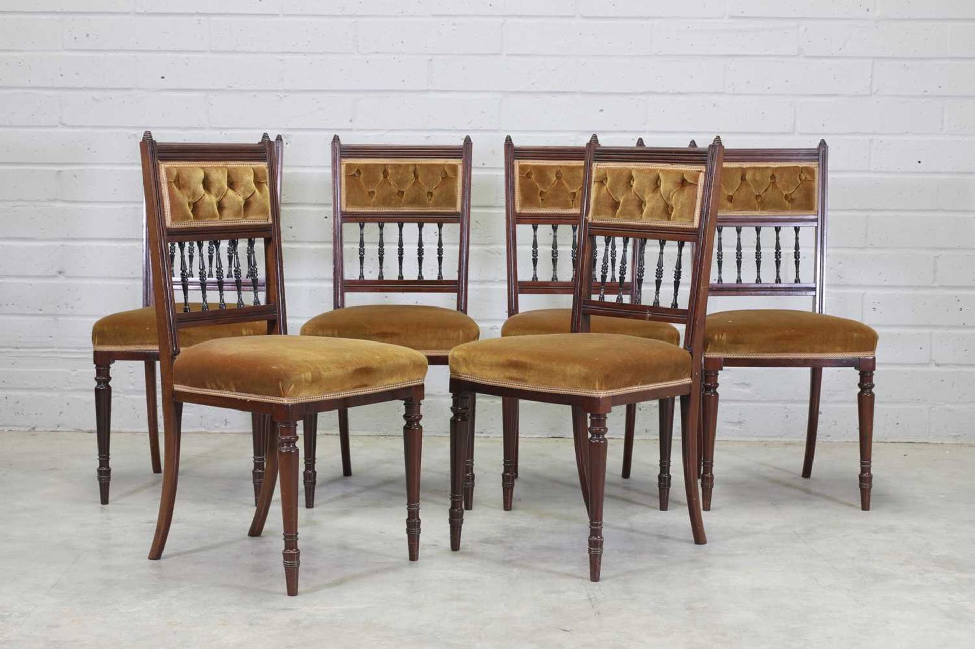A set of six rosewood and ebony dining chairs,