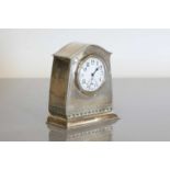 A Liberty & Co. silver-mounted clock,