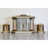 An Art Deco Sienna marble mantel clock,