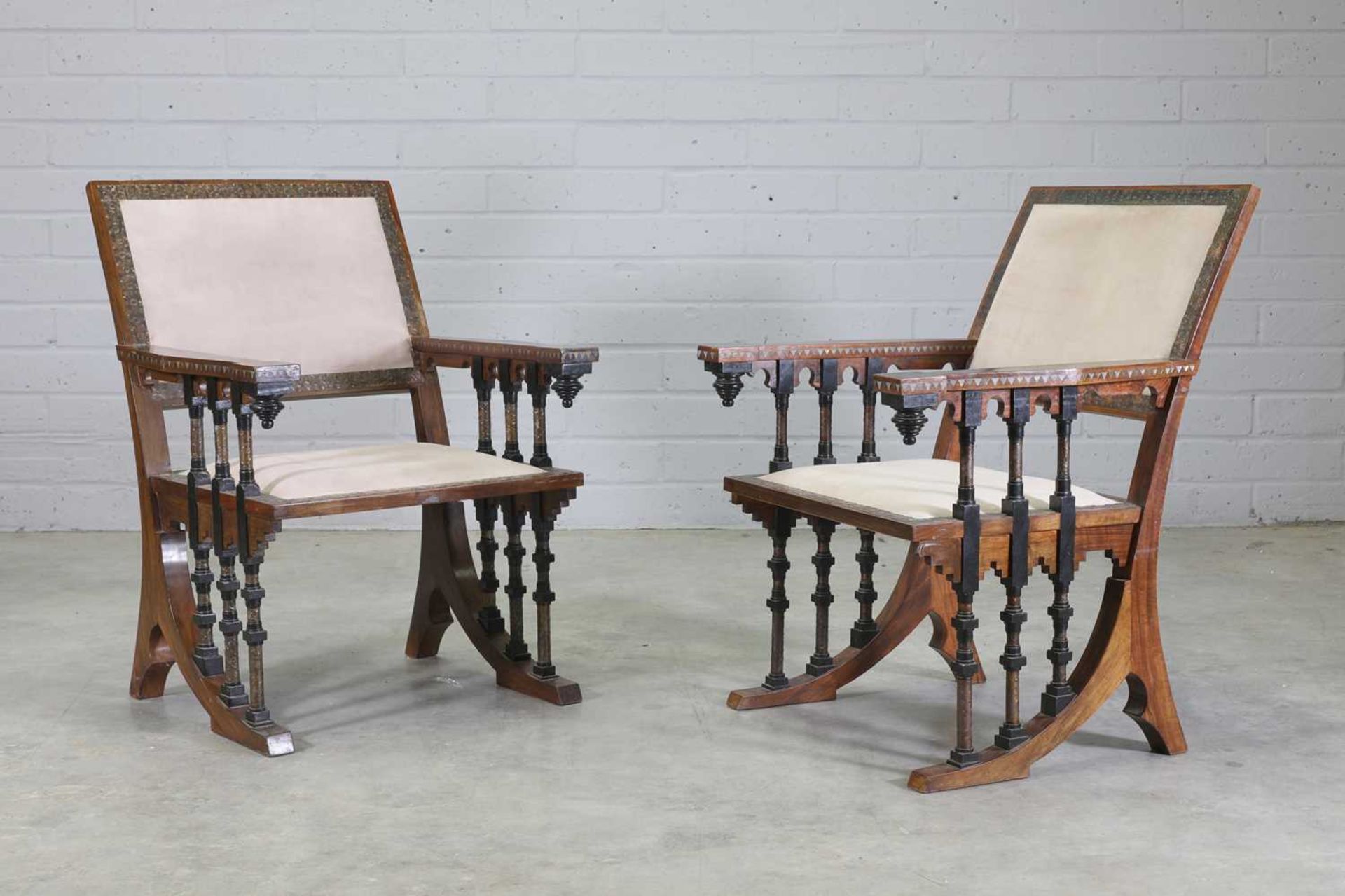A pair of walnut chairs,
