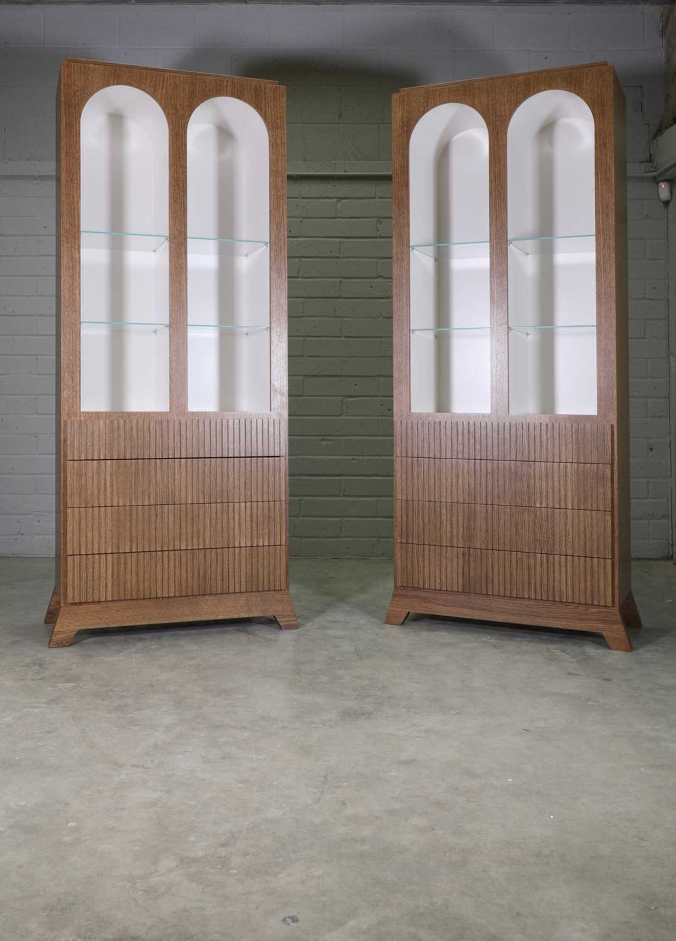 A pair of contemporary oak cabinets,