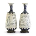 A pair of Doulton Lambeth vases,