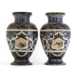 A pair of Doulton Lambeth stoneware vases,