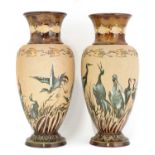 A pair of Doulton Lambeth stoneware vases,