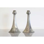 A pair of WMF Secessionist pewter candlesticks,