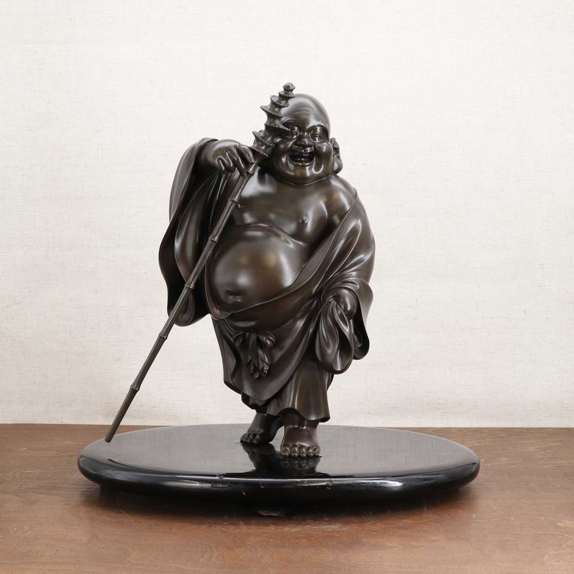 A Japanese bronze Hotei,