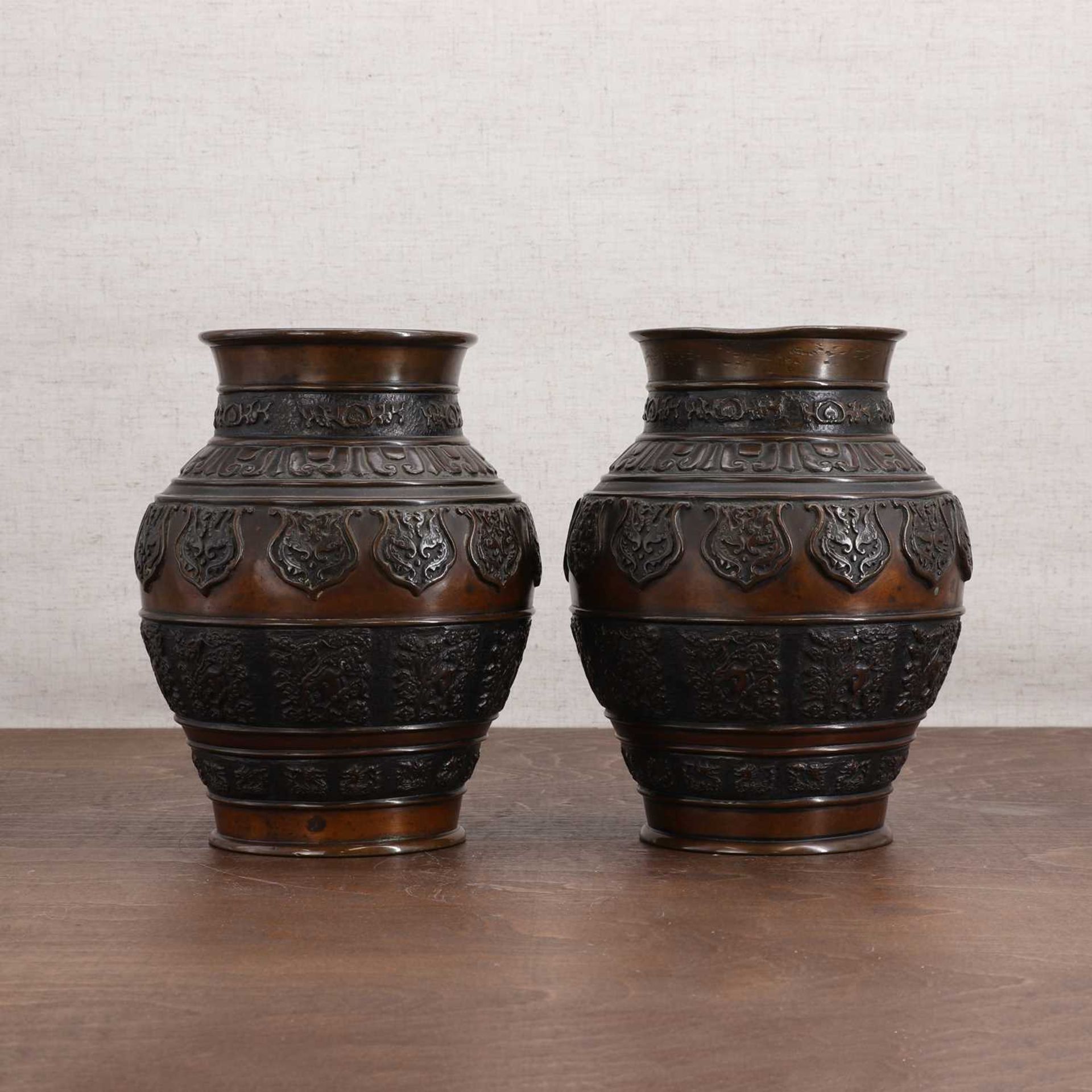 A pair of Japanese bronze vases,