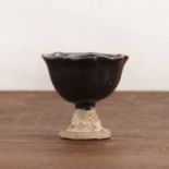 A Chinese stoneware stem cup,