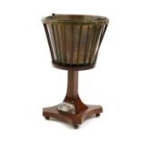 A mahogany wine cooler or jardiniere