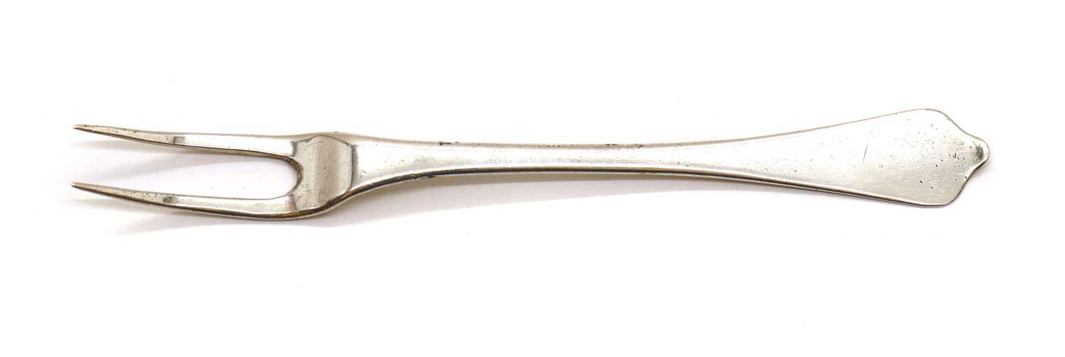 A Queen Anne silver sweetmeat fork