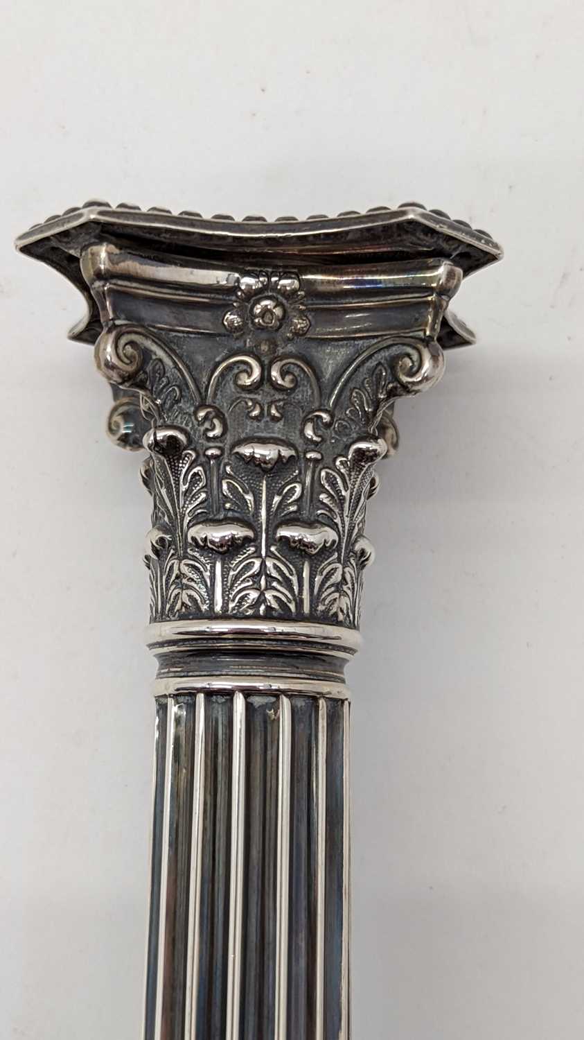 A pair of Victorian silver candlesticks - Image 8 of 24