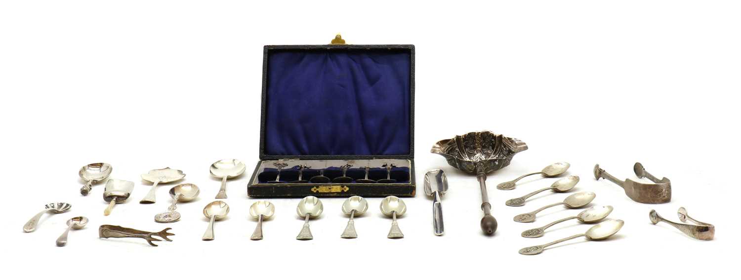 A collection of silver flatware,