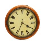 A mahogany wall clock