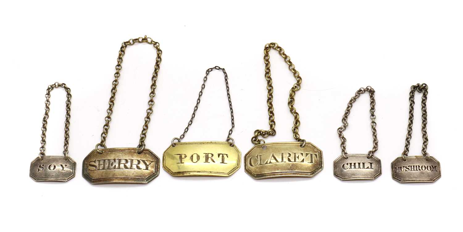 A group of five George III silver decanter labels,