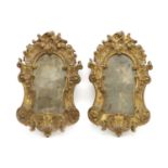 A pair of small giltwood mirrors,