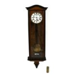 A Victorian walnut regulator wall clock