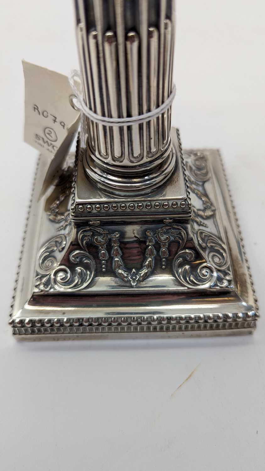 A pair of Victorian silver candlesticks - Image 5 of 24