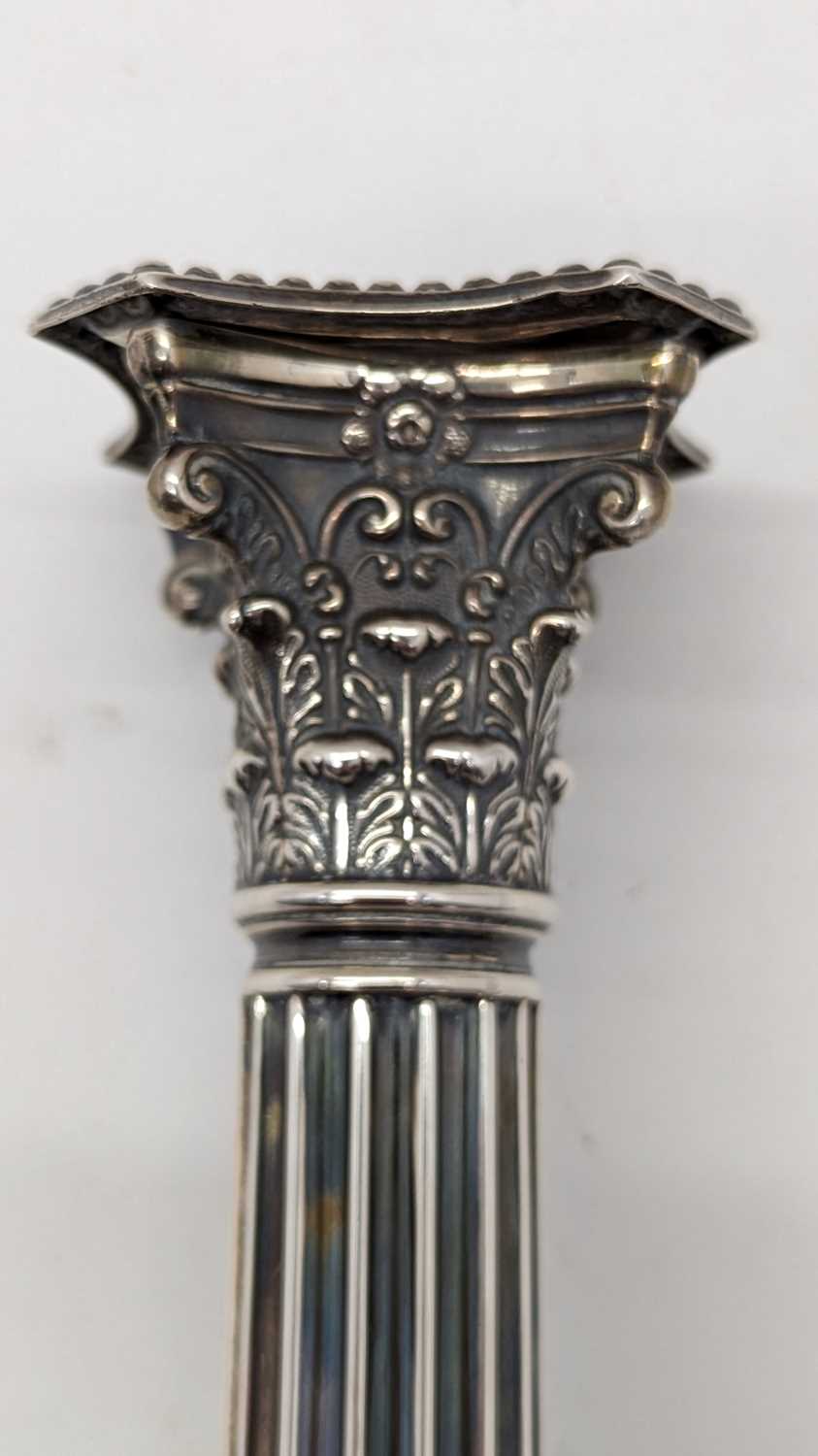 A pair of Victorian silver candlesticks - Image 10 of 24