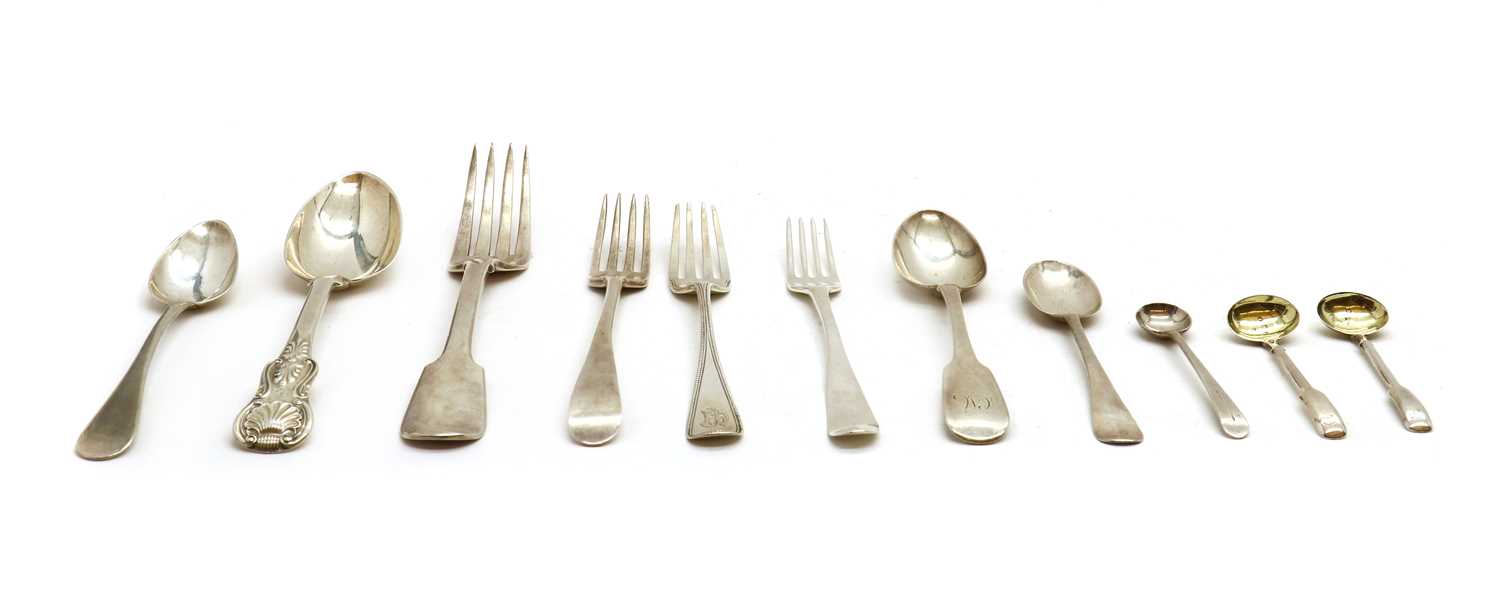 A collection of silver flatware