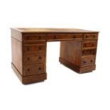 A late 19th century mahogany pedestal desk