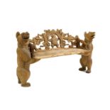 A carved teak hall bench in the Black Forest-style,