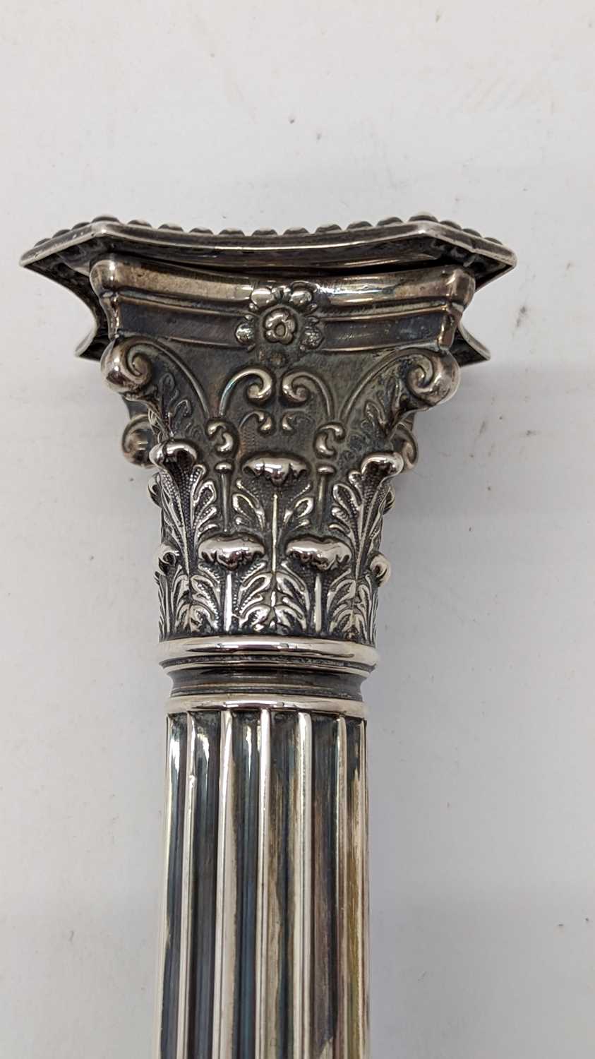 A pair of Victorian silver candlesticks - Image 11 of 24